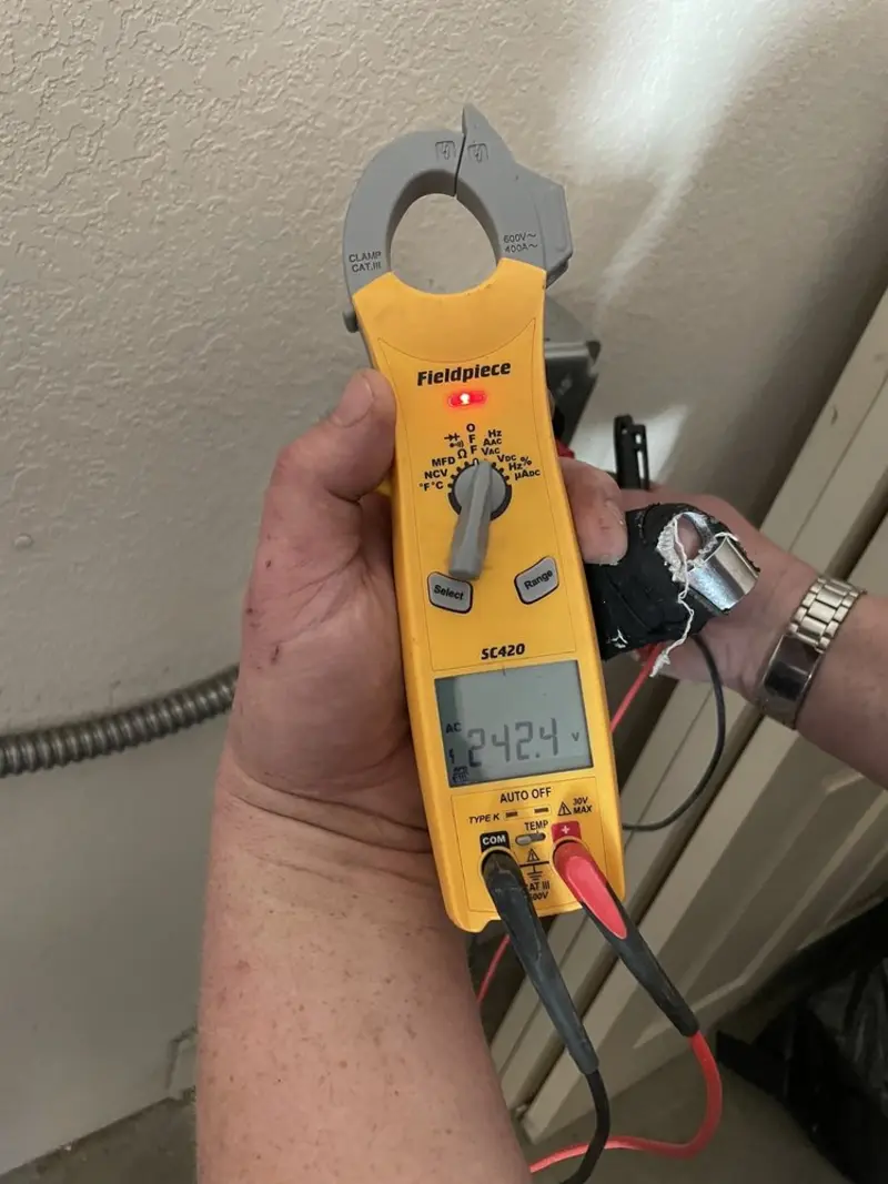 Voltage testing with clamp meter during Aluminum Wiring Replacement in Ankeny